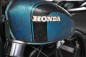 The duck blue color tank comes from a 70's Honda CB motorcycle