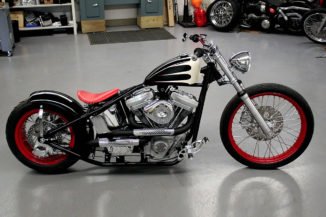 Black and white 66 Bobber with 21in front tire