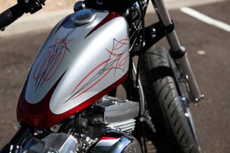 silver and red 66 bobber tank