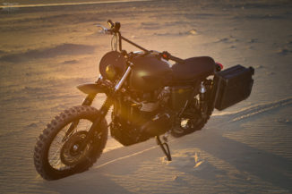 custom Triumph Scrambler EFI features a chopped up grill to fit the headlight